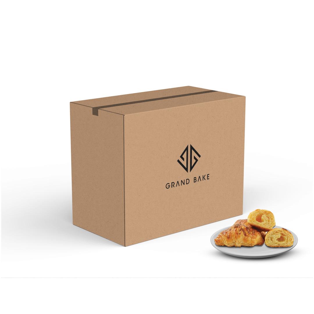 A cartoon box labeled 'GRAND BAKE' containing cheese croissants 60 gm *70pcs next to a plate of plane croissant.