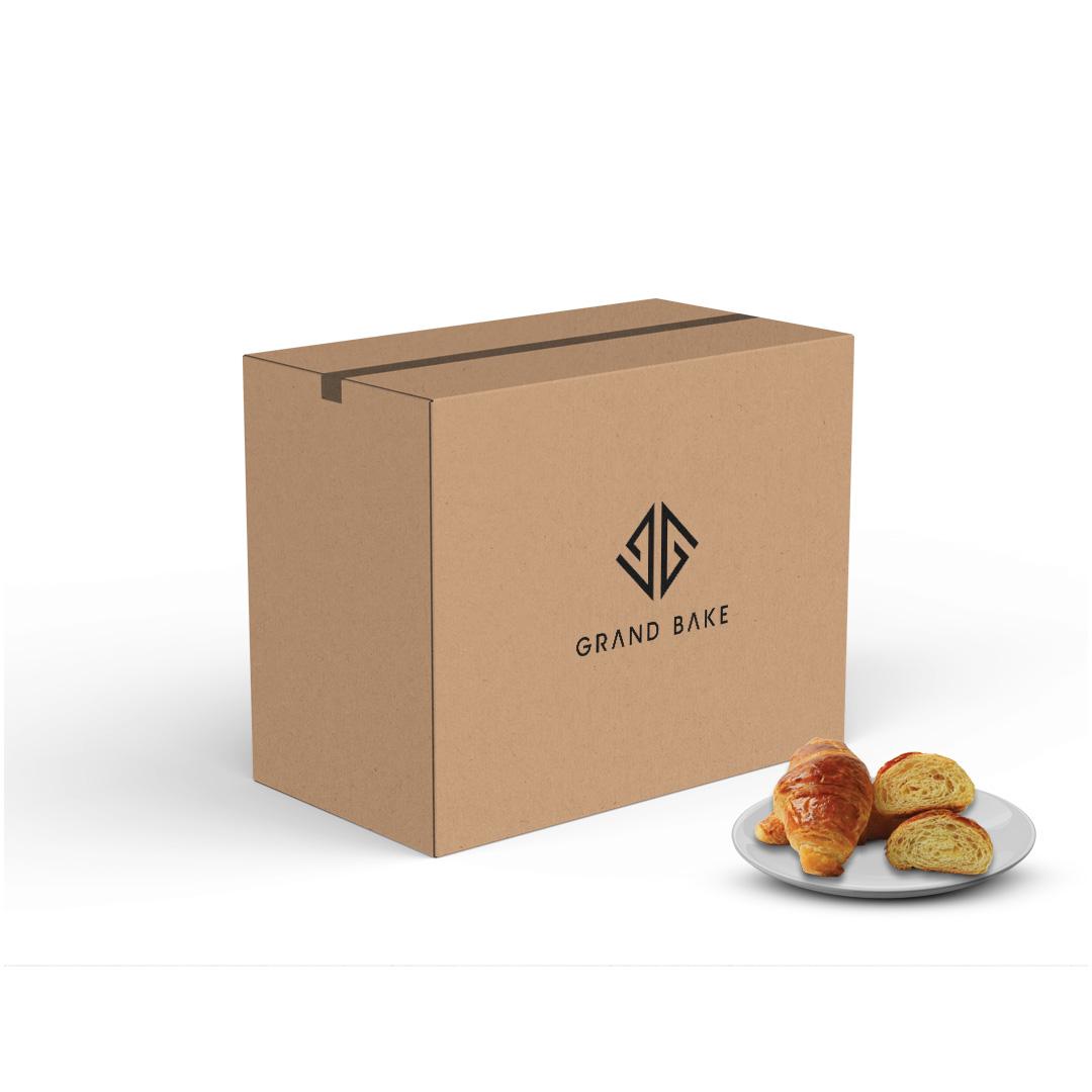 A cardboard box with the 'GRAND BAKE' logo on it, next to a plate with plain croissants contain  30GM*200pcs